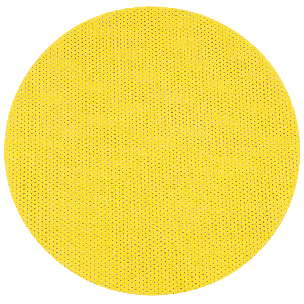 Eine große runde gelbe, texturierte Scheibe mit einem gleichmäßigen Muster aus kleinen Perforationen, die an eine Schleifscheibe oder einen Filter erinnert, zentriert vor weißem Hintergrund.